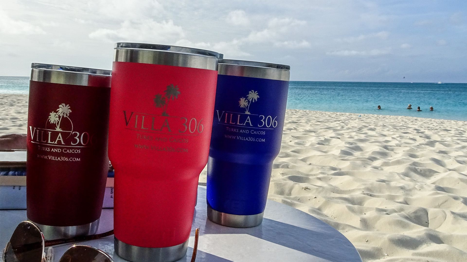 Yeti drink cups on the beach.